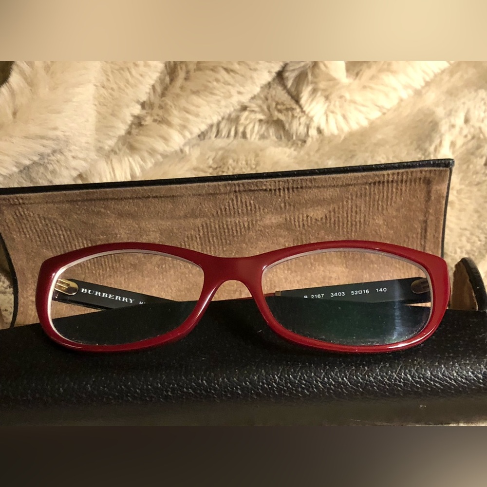 Burberry eyeglass frames. Burgundy with classic Burberry plaid arms. Pristine